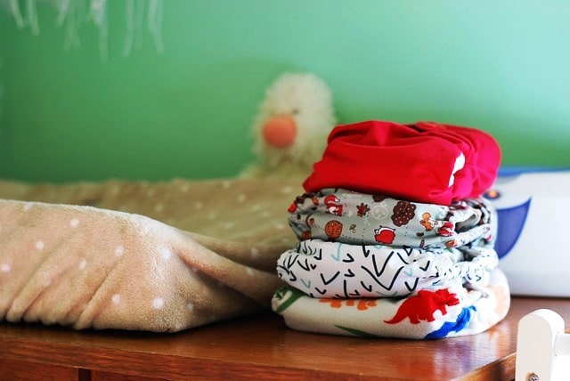 How do cloth diapers work with poop?