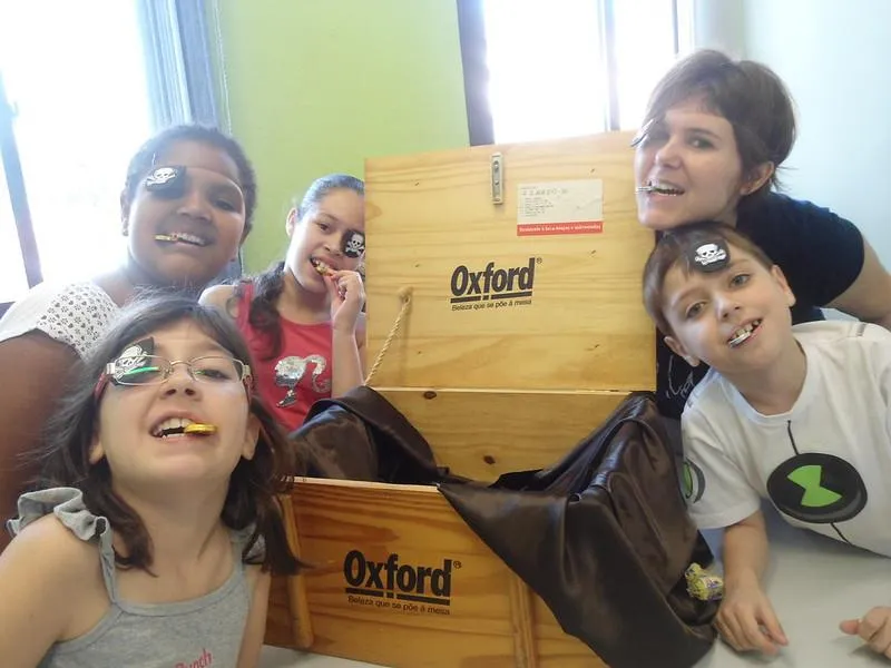 kids with a mystery box indoors 